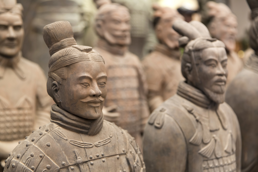 Secrets Of China’s Terracotta Army 1 Close-up view of terracotta warrior statues from Xi’an, China, featuring detailed facial features and hairstyles of high-ranking officers