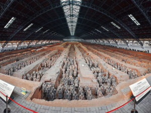 Secrets Of China’s Terracotta Army 3 View of multiple Terracotta Warriors standing in formation inside Pit 1 at the mausoleum site in Xi’an, China
